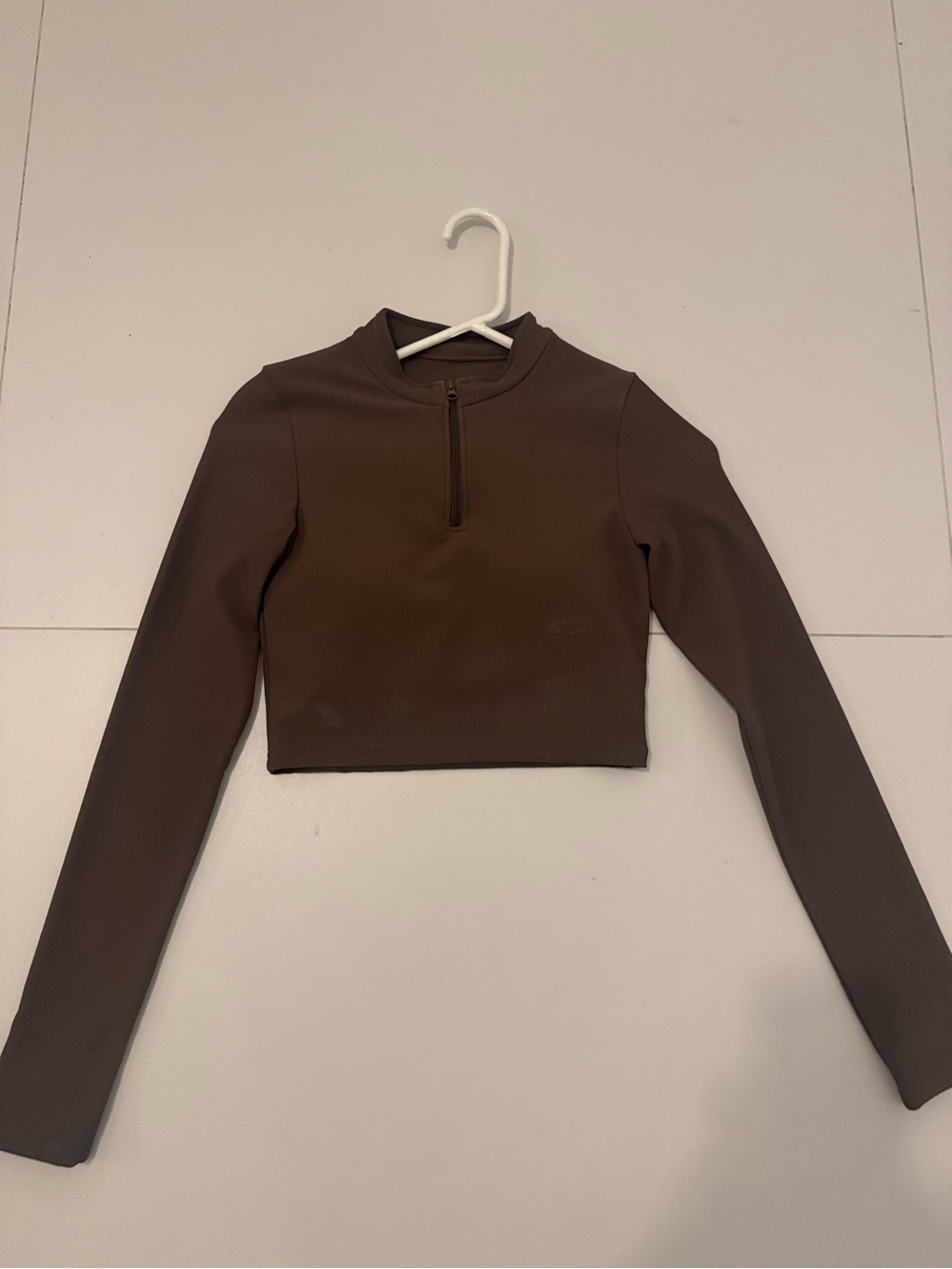 Cropped Long-Sleeve Mock Neck Top in Brown